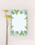 floral notepad with blue and green flowers
