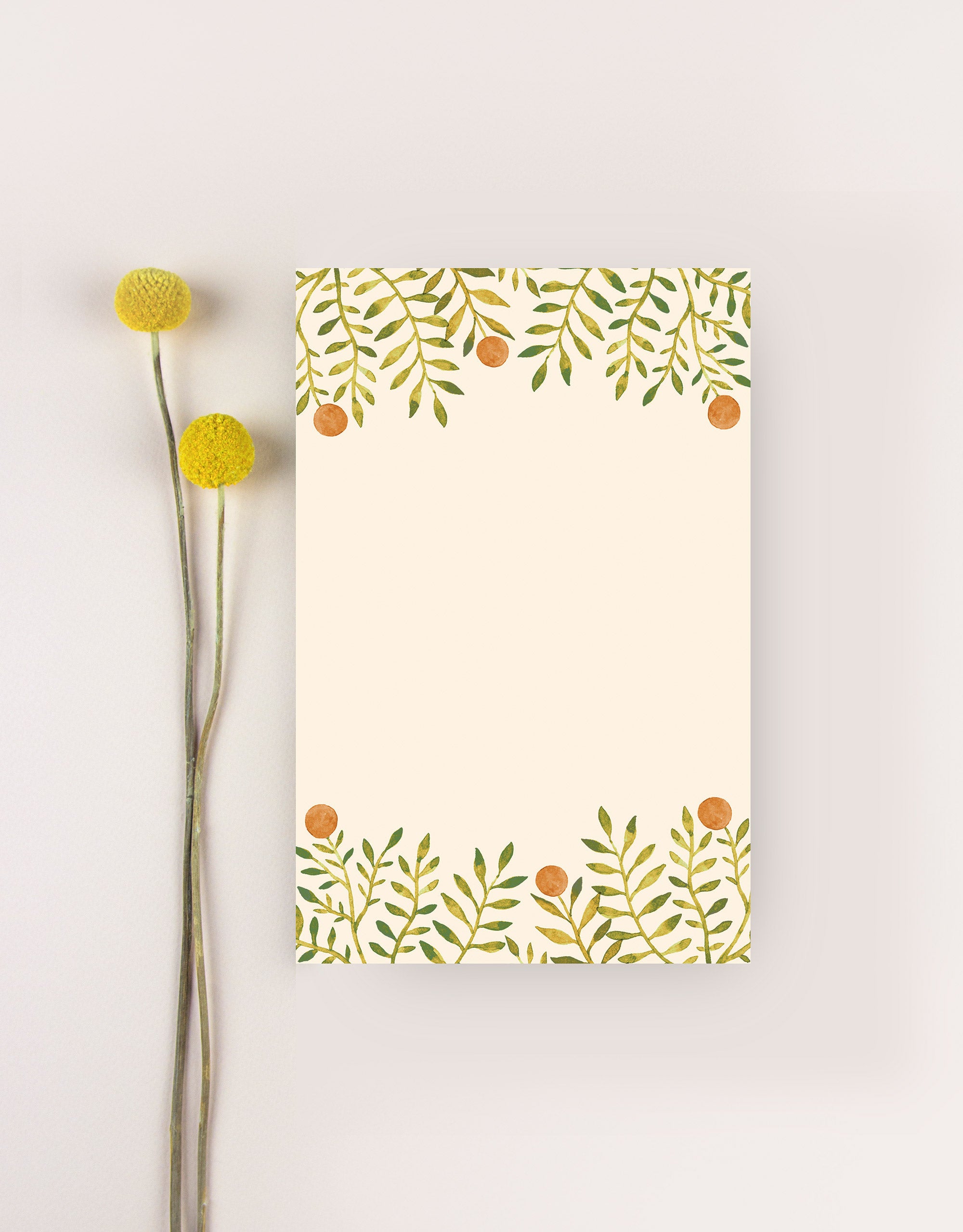 yellow tear off notepad with oranges
