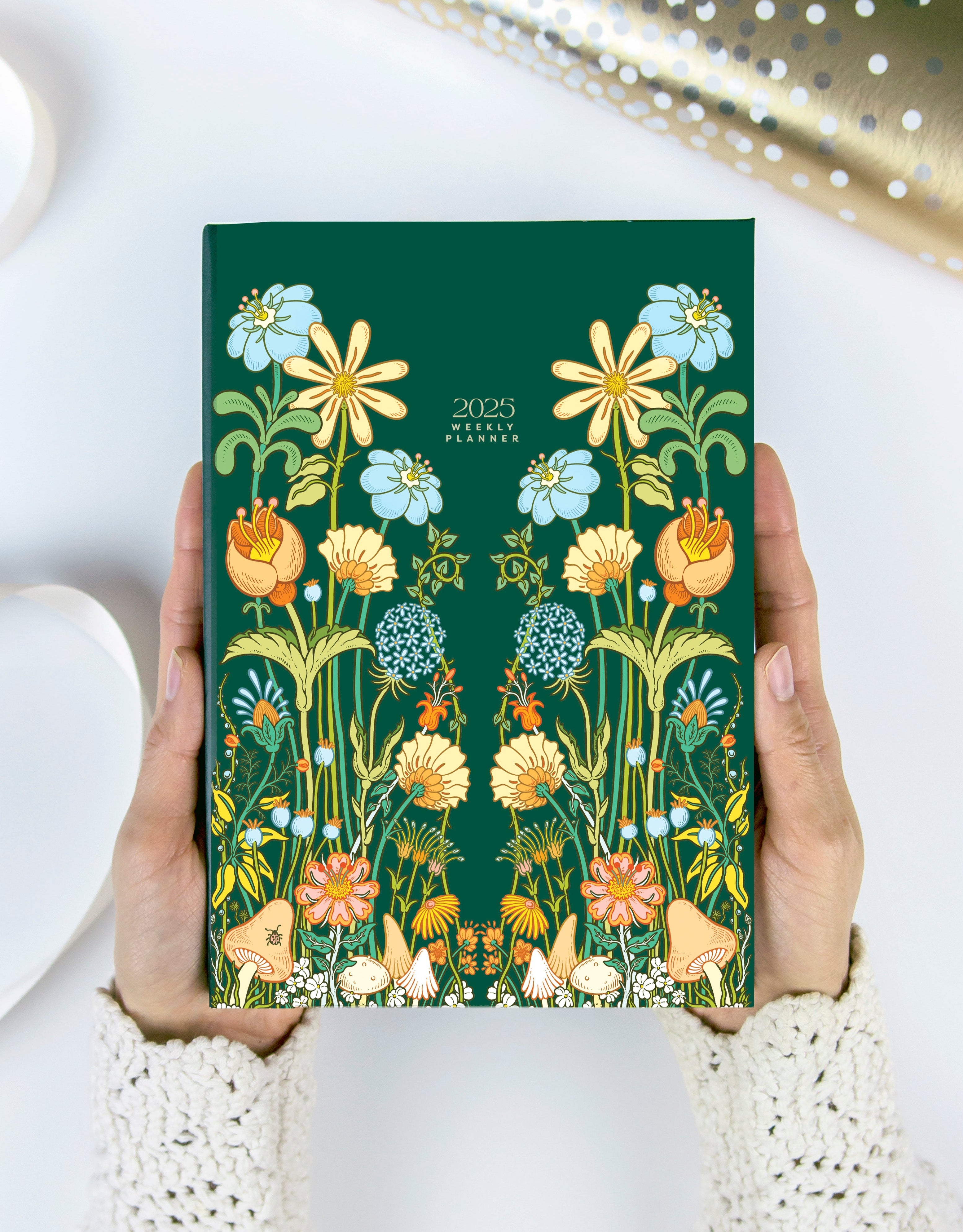 2025 dated planner with colorful floral illustrated hard cover