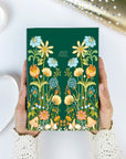 2025 dated planner with colorful floral illustrated hard cover