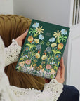 video of 2025 weekly hardcover planner featuring beautiful floral garden illustration 